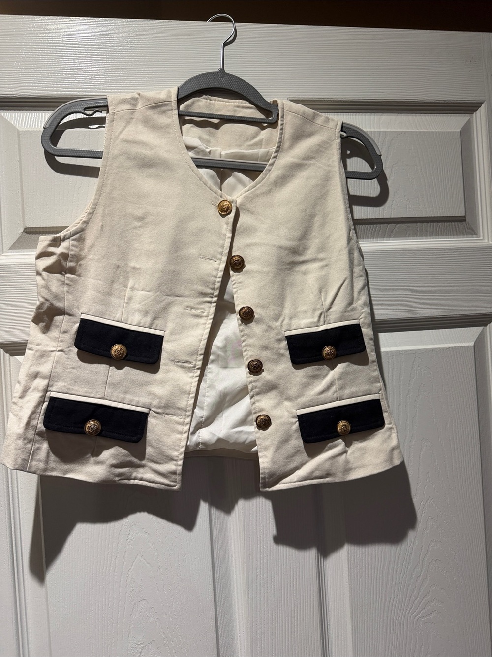 Girls Cream Vest with Navy Trim and Gold Buttons
